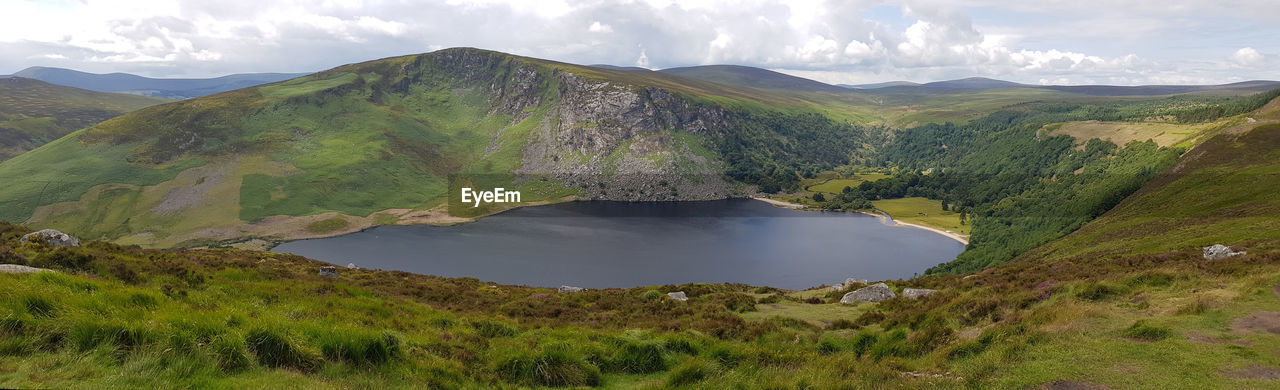 environment, mountain, lake, landscape, highland, scenics - nature, water, beauty in nature, land, nature, cloud, mountain range, sky, wilderness, mountain pass, reservoir, plant, travel destinations, travel, no people, ridge, non-urban scene, grass, tranquility, crater lake, plateau, panoramic, volcano, tranquil scene, tourism, outdoors, activity, social issues, day, green, valley, forest, meadow, idyllic, geology, tree, leisure activity, volcanic crater