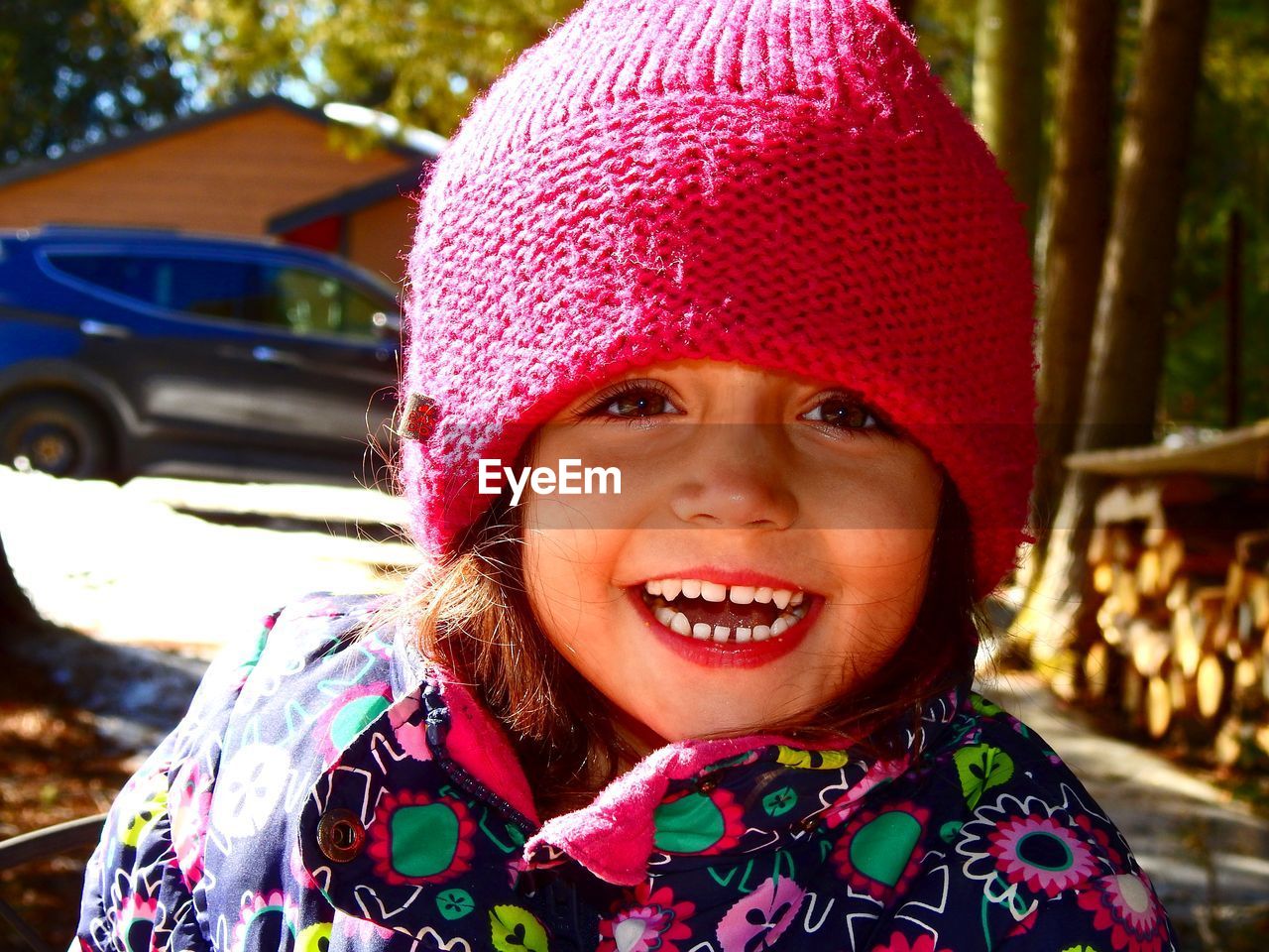 Portrait of happy girl wearing hat