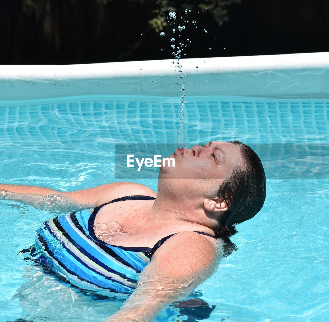 Woman in swimming pool