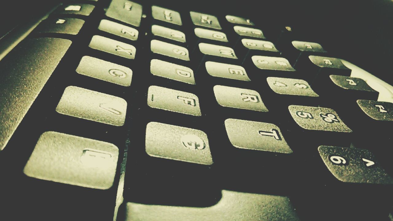 CLOSE-UP OF LAPTOP ON TABLE