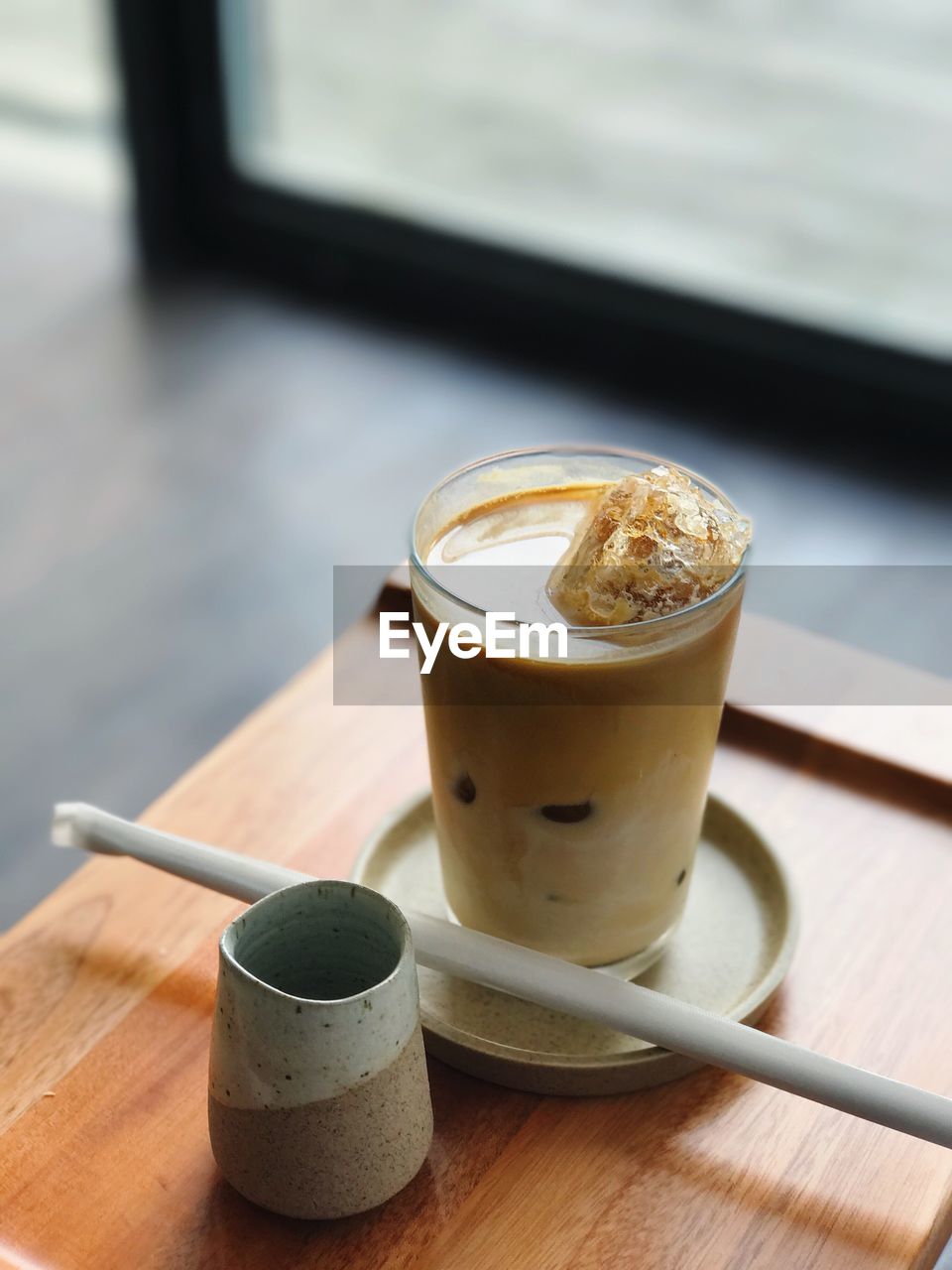 CLOSE-UP OF COFFEE SERVED ON TABLE