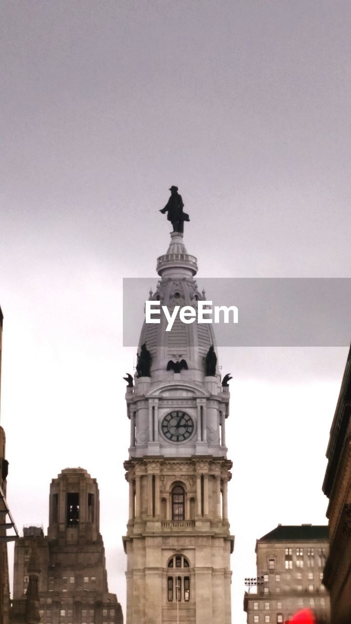 Low angle view of philadelphia city hall against sky