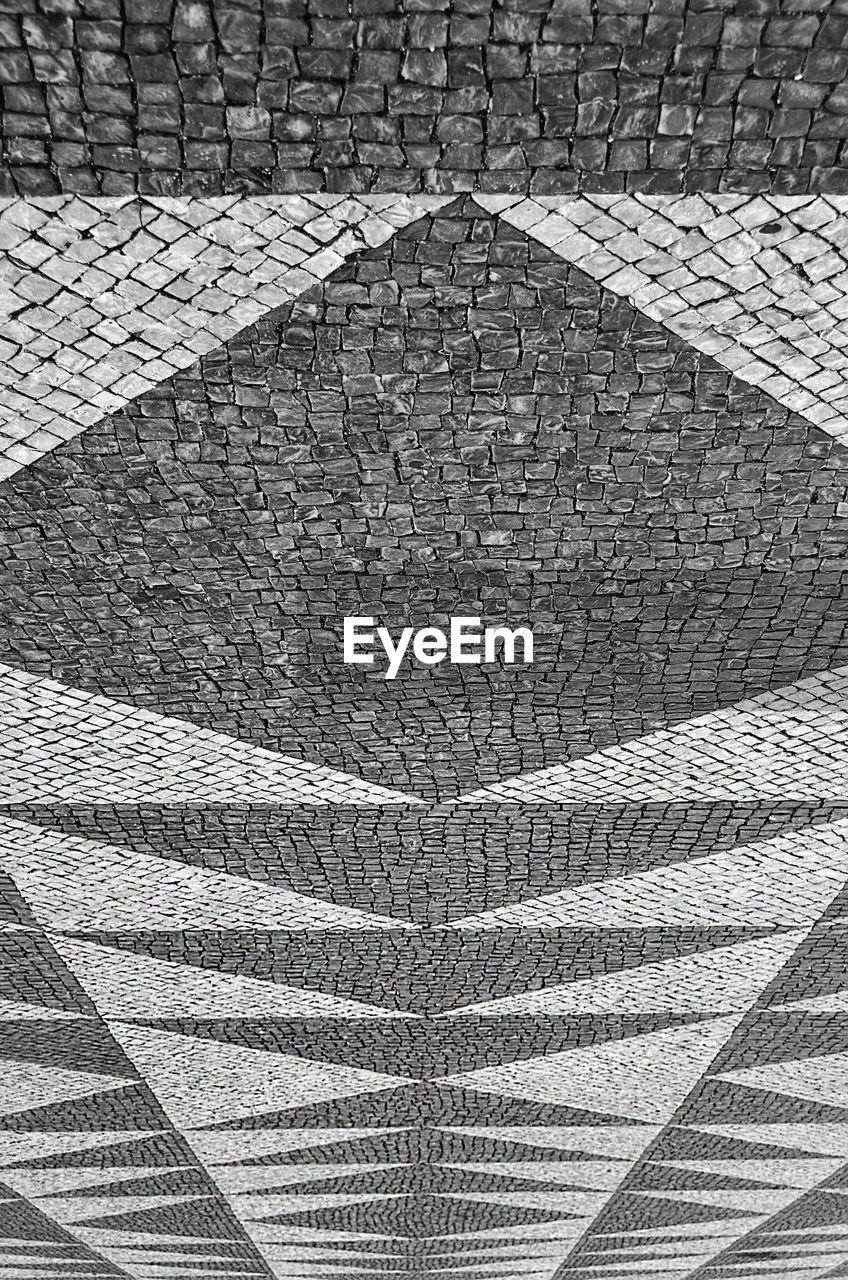 CLOSE-UP OF PAVING STONE