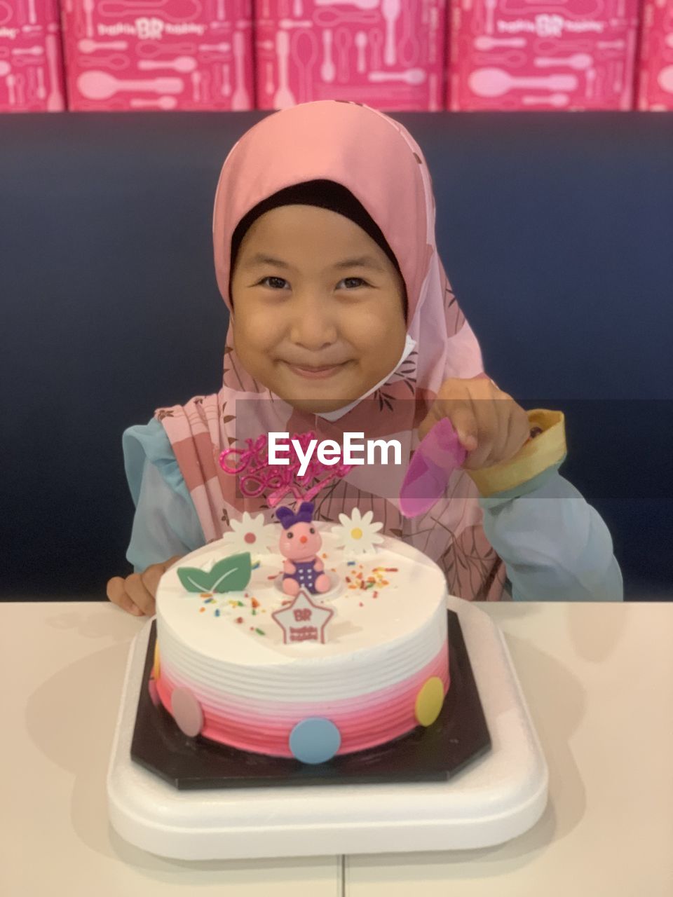 portrait, one person, pink, food, food and drink, smiling, child, birthday cake, looking at camera, childhood, women, sweet food, sweet, happiness, indoors, front view, dessert, celebration, emotion, event, female, cake, baked, waist up, cheerful, cute, birthday, table, holding, adult, headshot, clothing, baby, enjoyment, anniversary, lifestyles, positive emotion, party, toddler, person, innocence, freshness