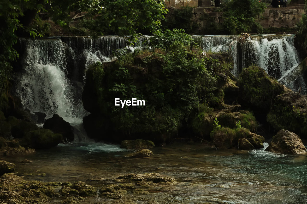 River waterfall flowing through rocks