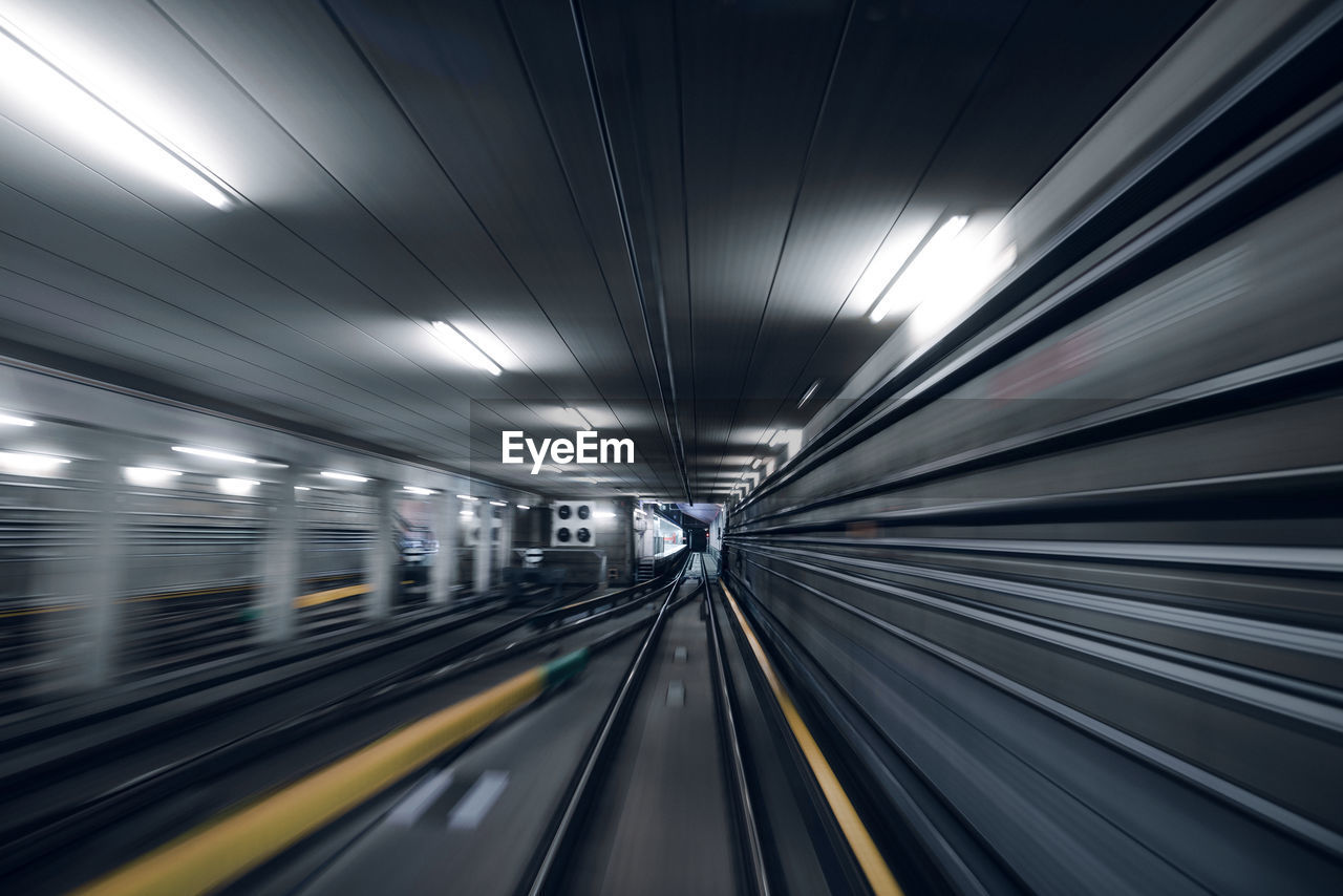 Blurred motion of train at subway station