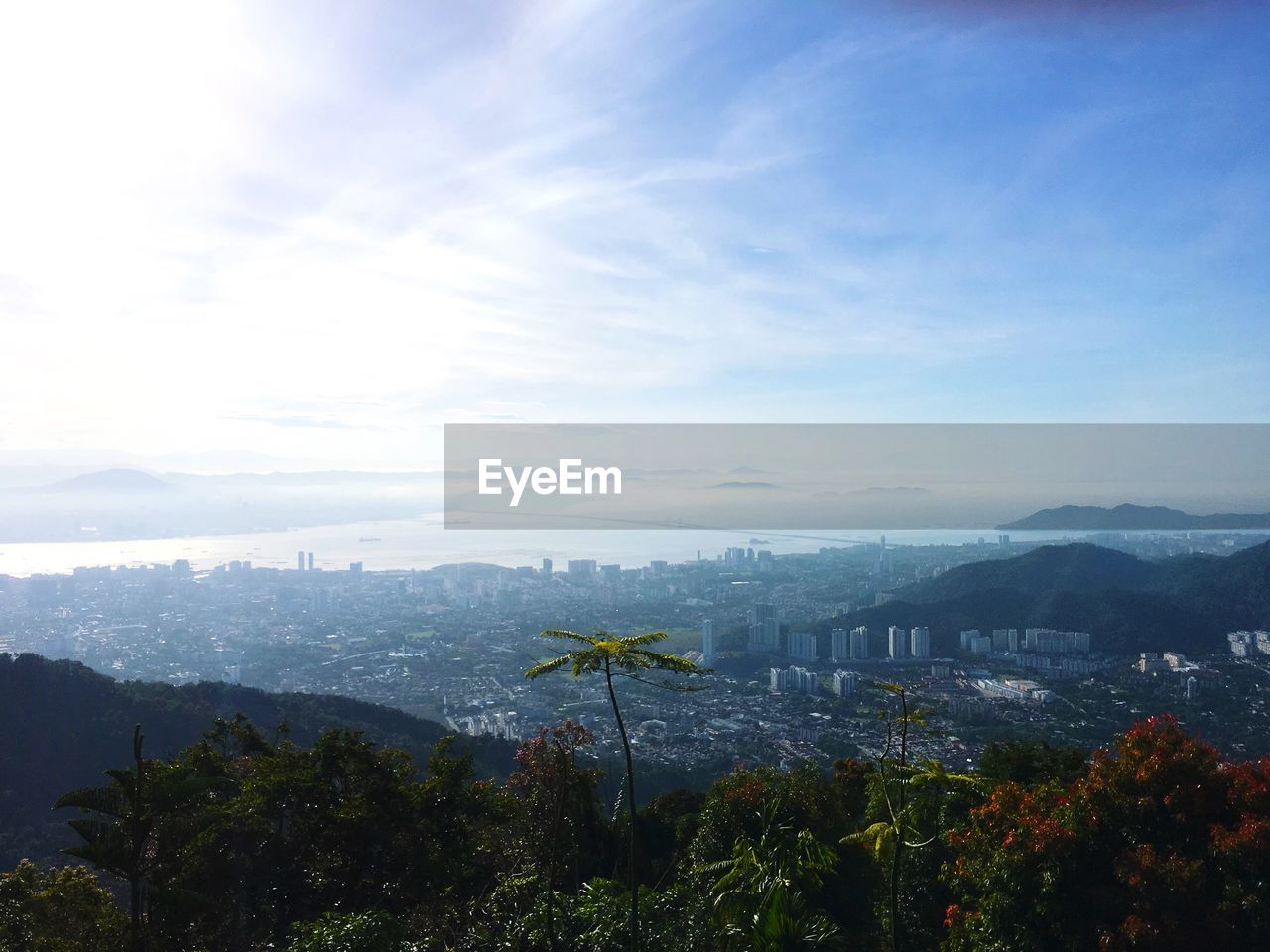 Scenic view of cityscape against sky