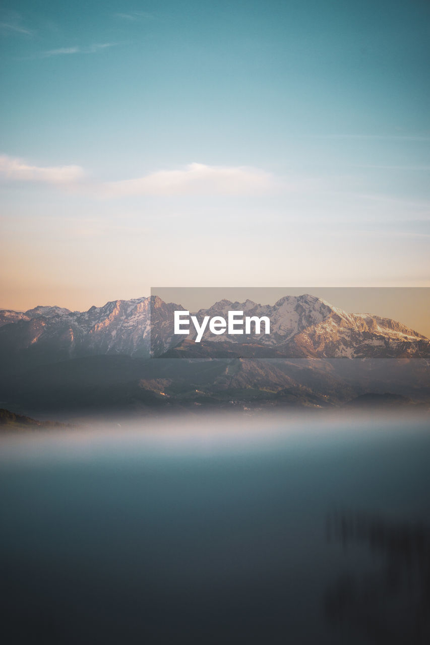 Scenic view of mountains against sky during sunset