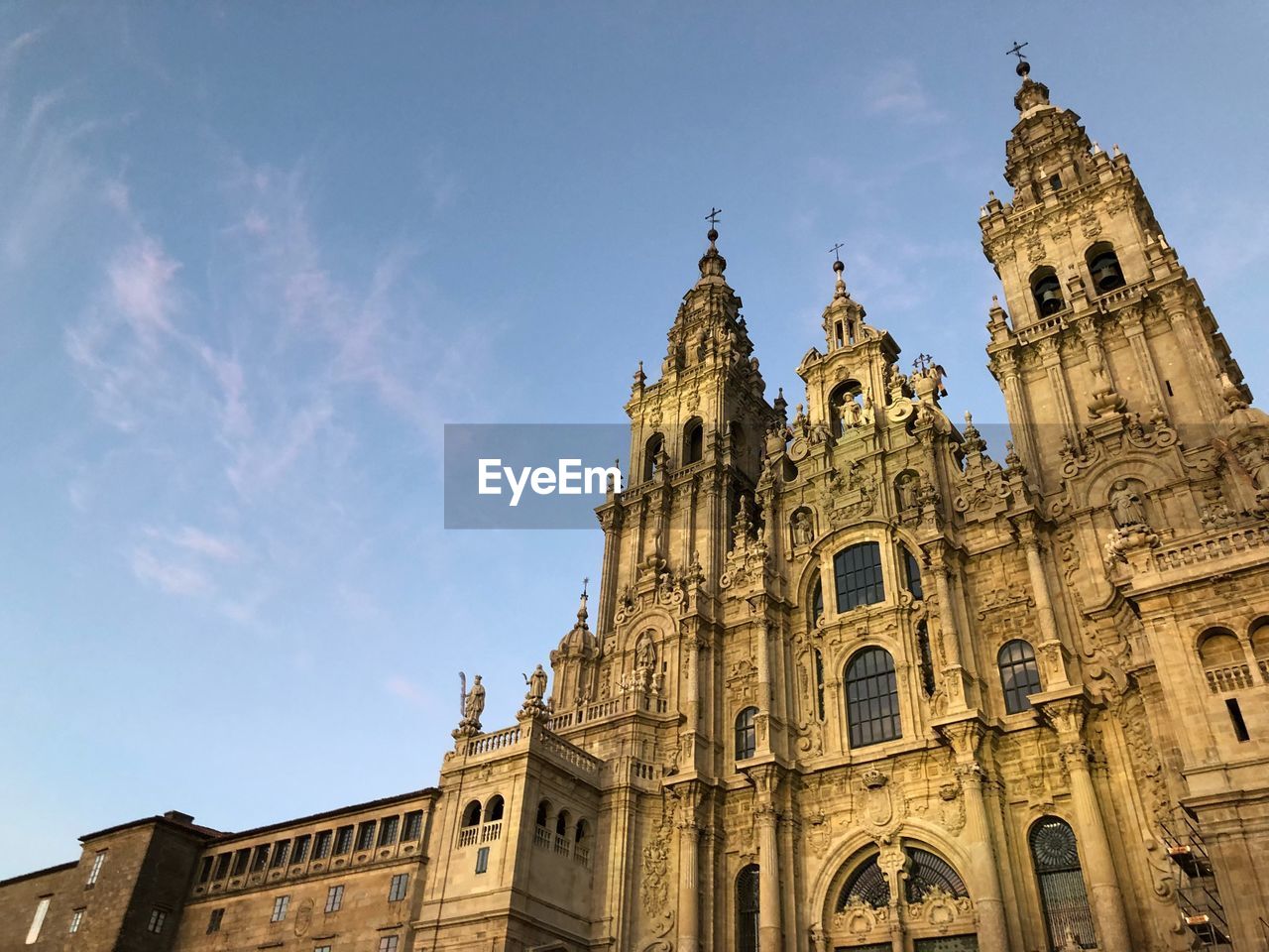 Low angle view of santiago de compostela cathedral against sky