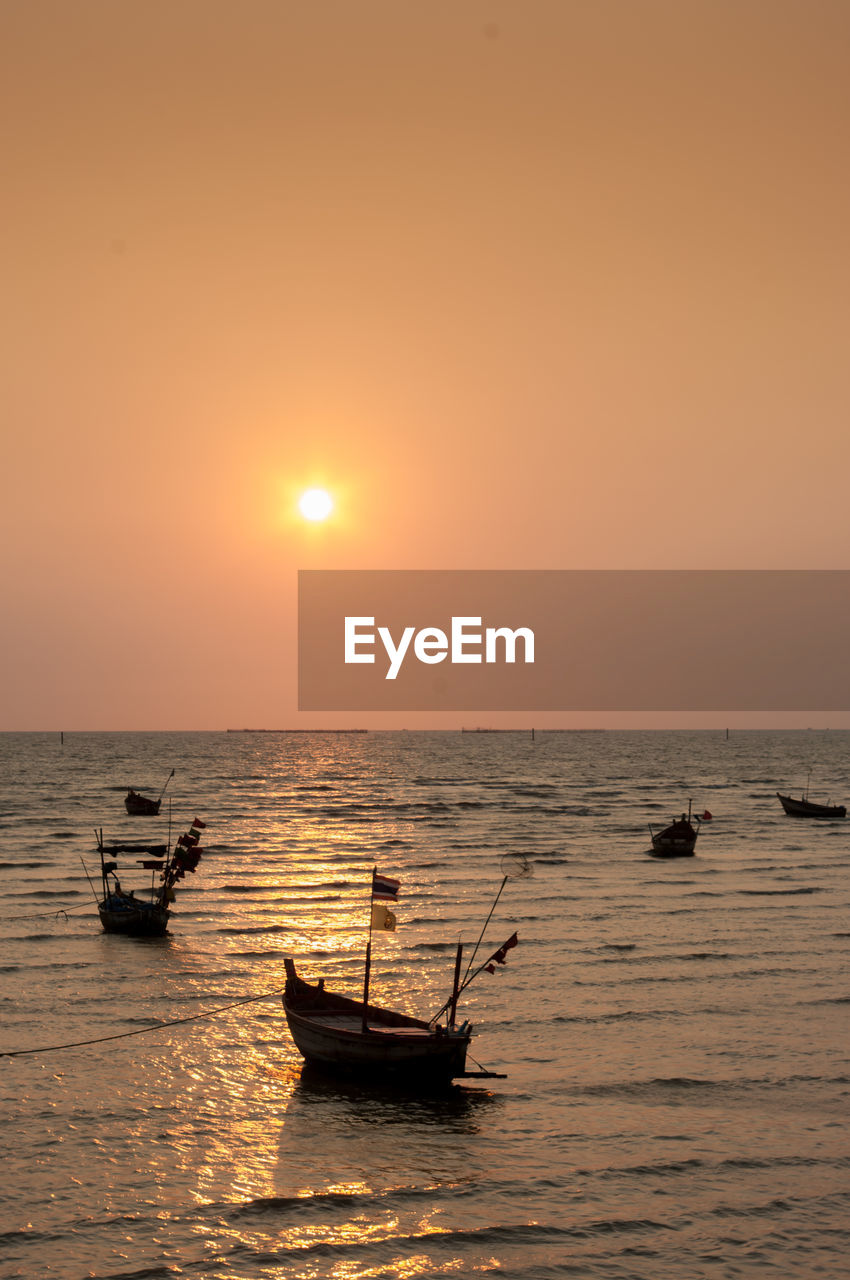 High angle view of fishing boat on sea against sky