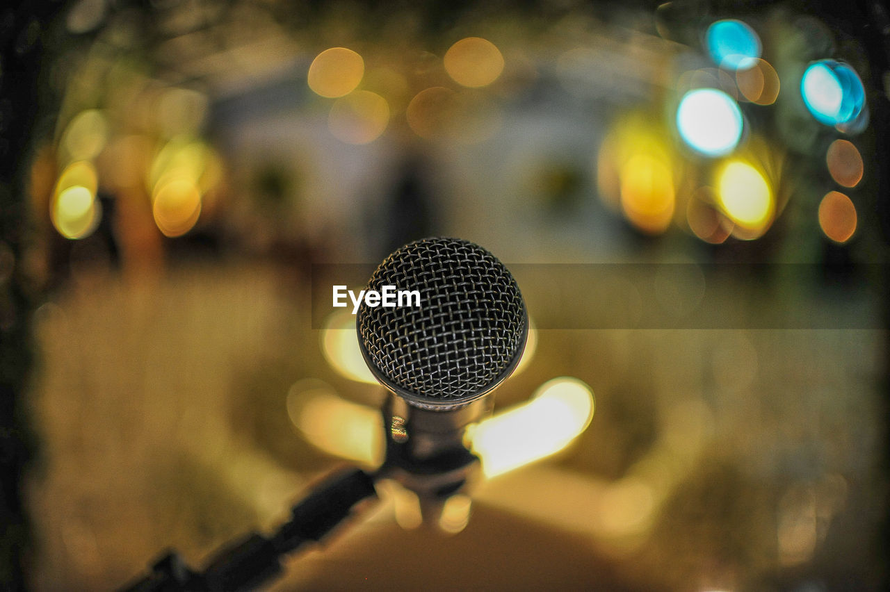 High angle view of microphone in illuminated room