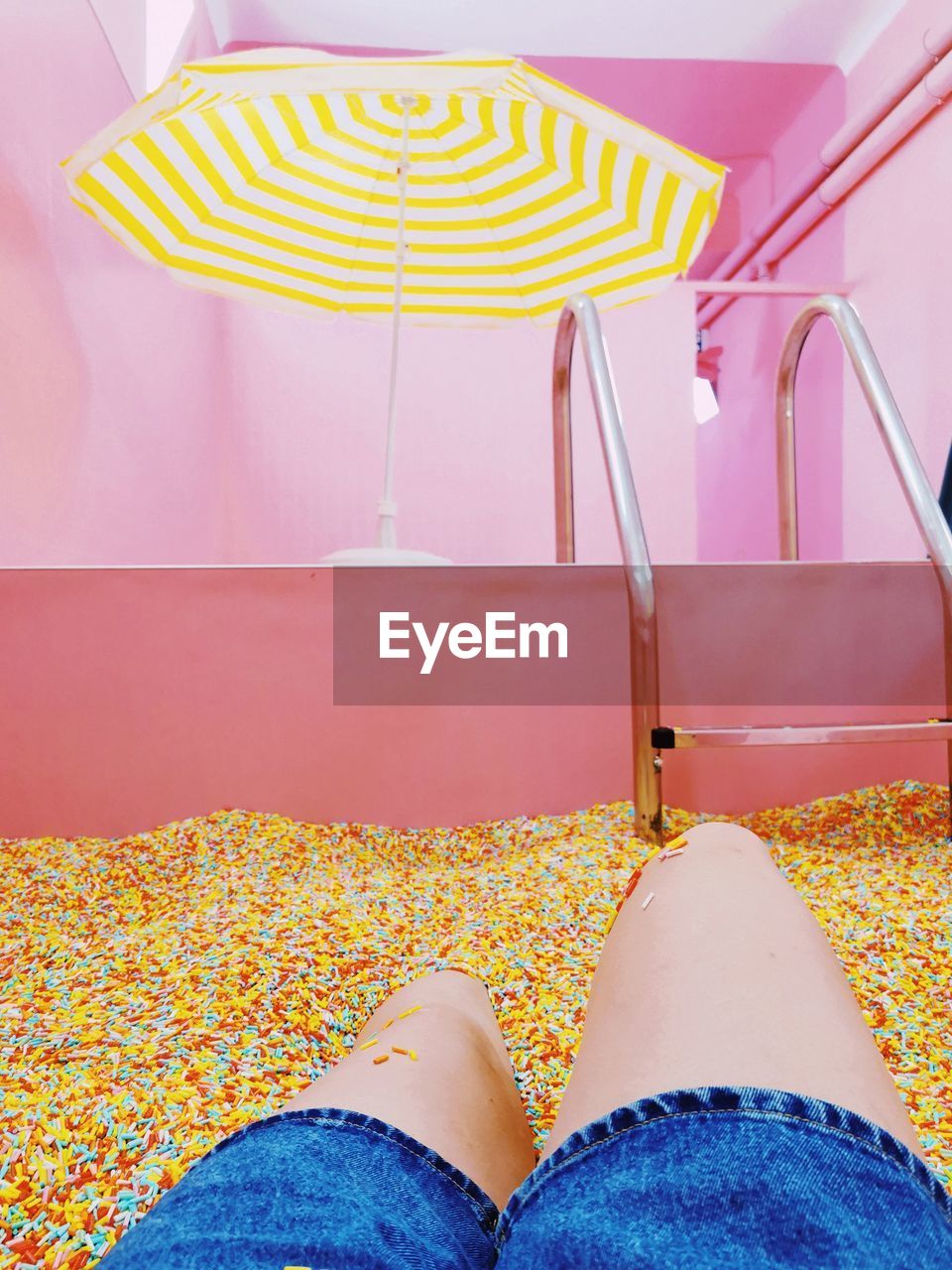 Low section of woman relaxing at home