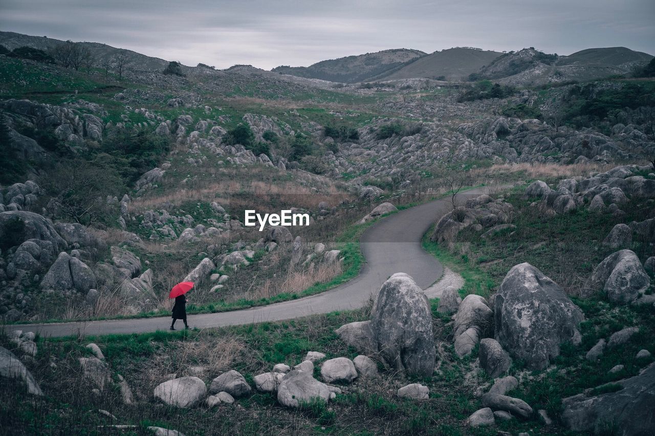 Woman walking in mountains