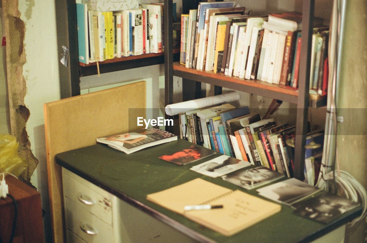 VIEW OF BOOKS IN SHELF