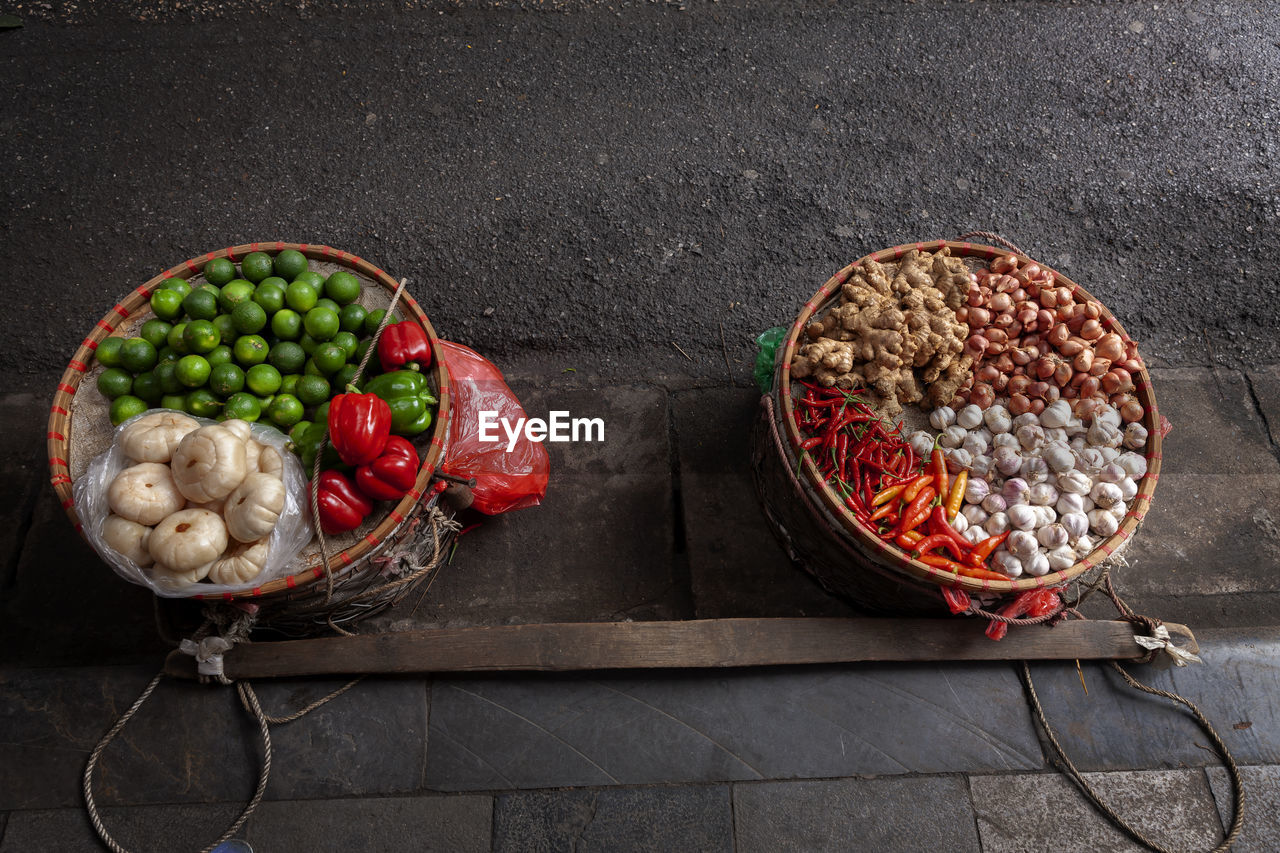 High angle view of fruits in basket on table