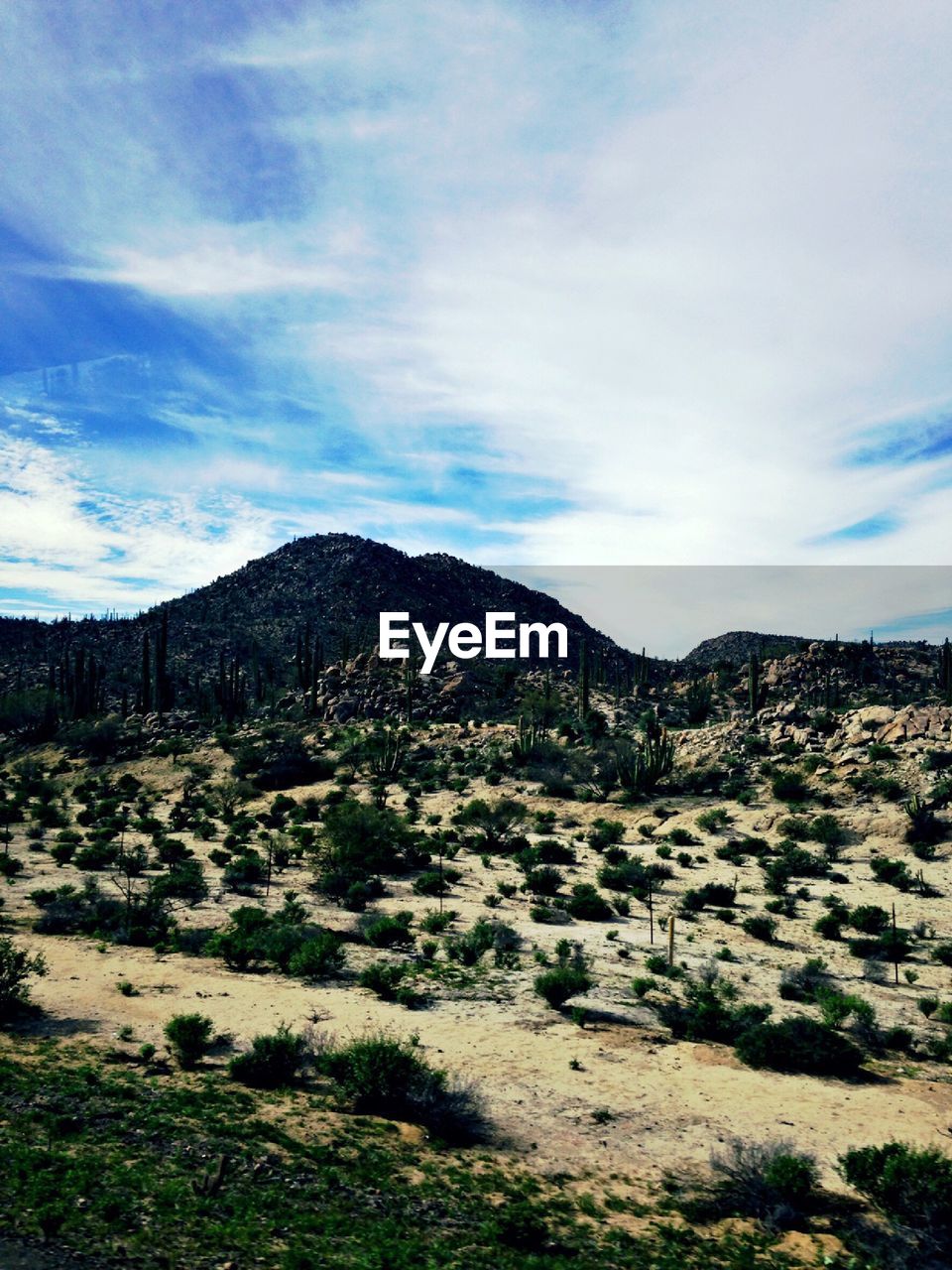 SCENIC VIEW OF MOUNTAIN AGAINST SKY