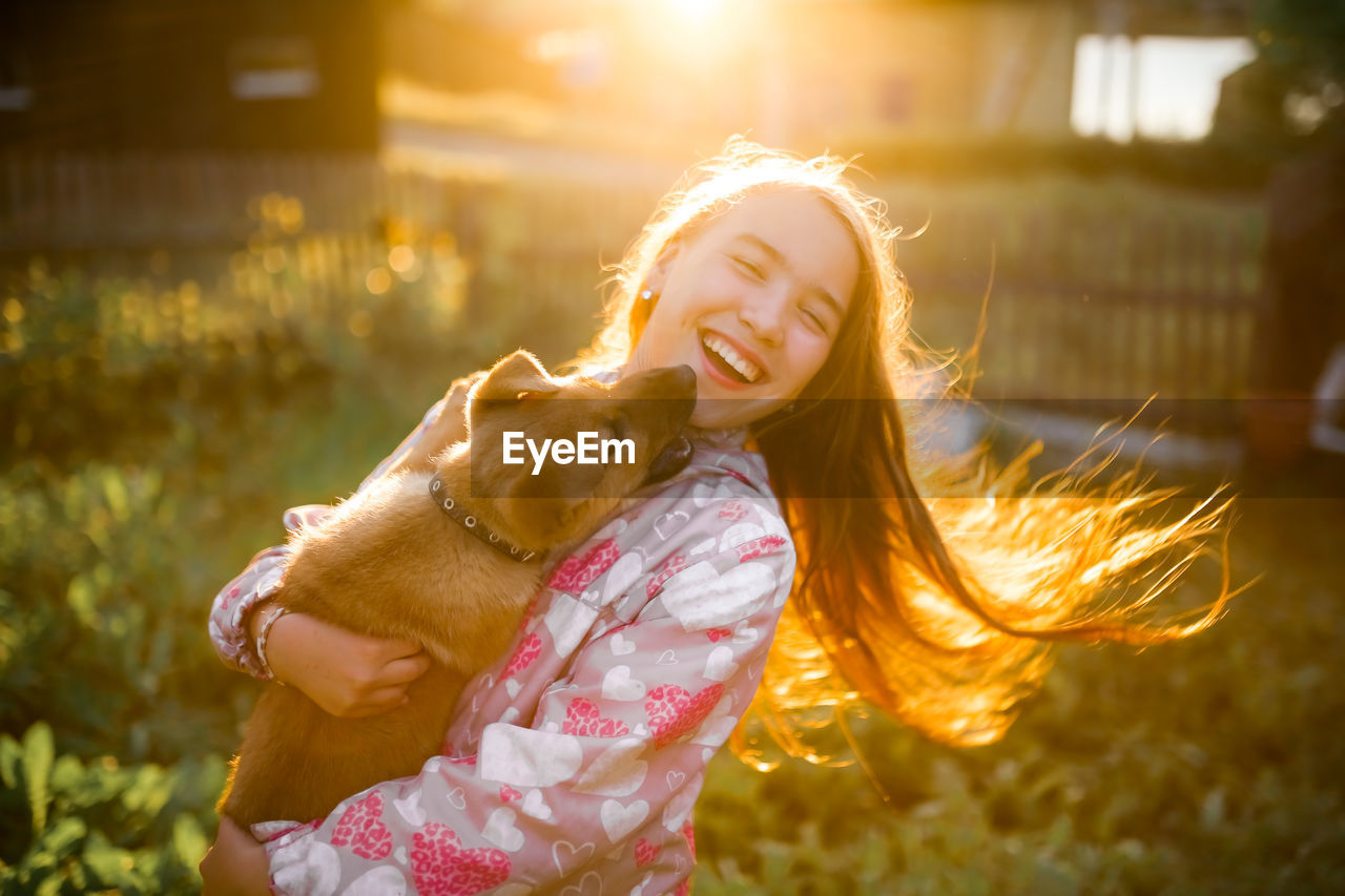 Young girl smiling outdoors