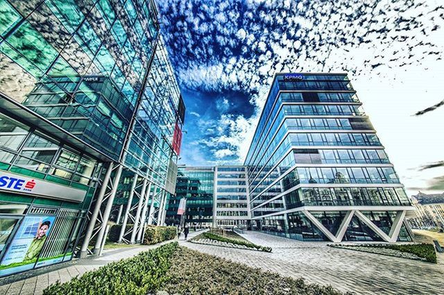 VIEW OF CITY STREET AGAINST SKY