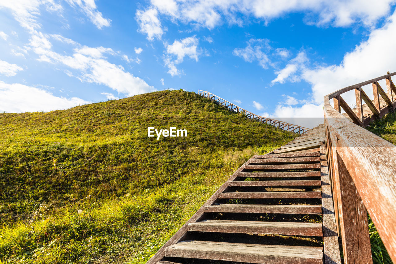 Wooden stairs going up to the historical mound of seredzius, lithuania