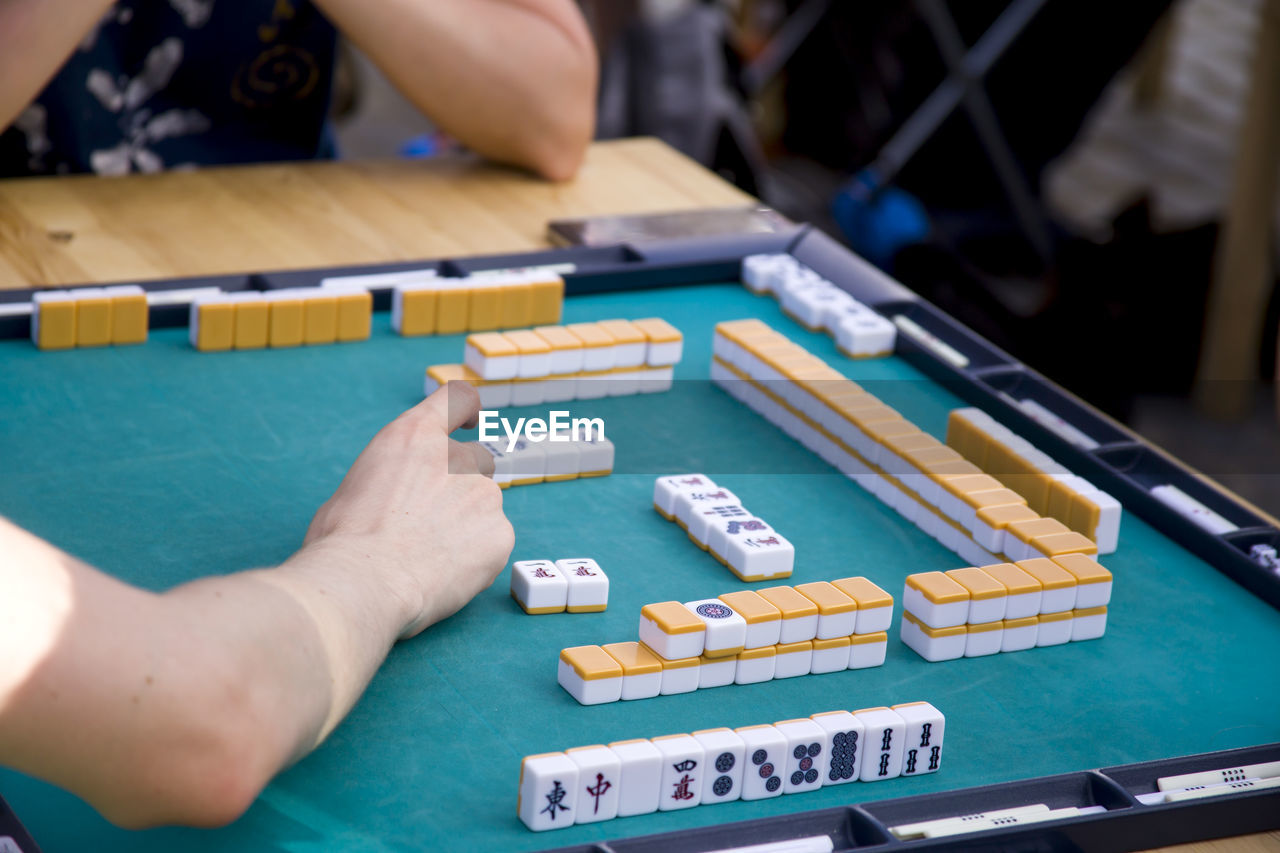 Close-up of women playing board game