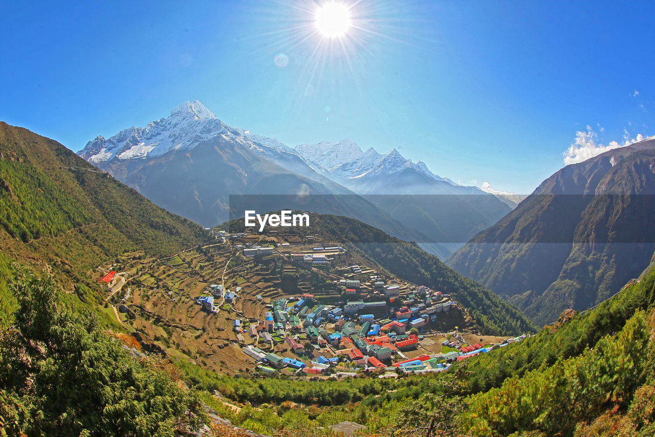 Scenic view of mountains against sky during winter