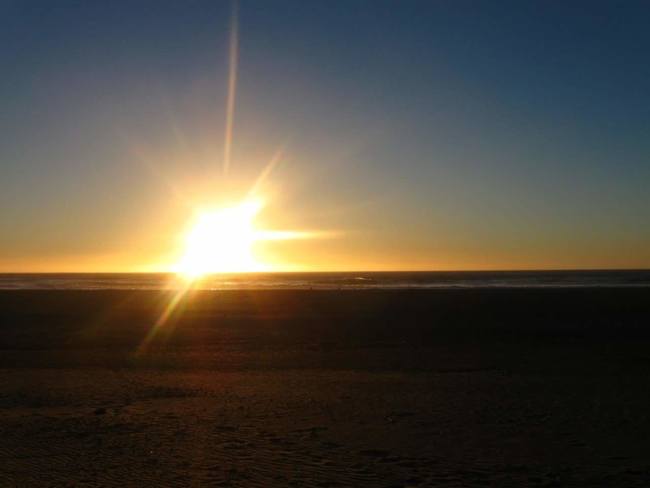 Scenic view of sea at sunset