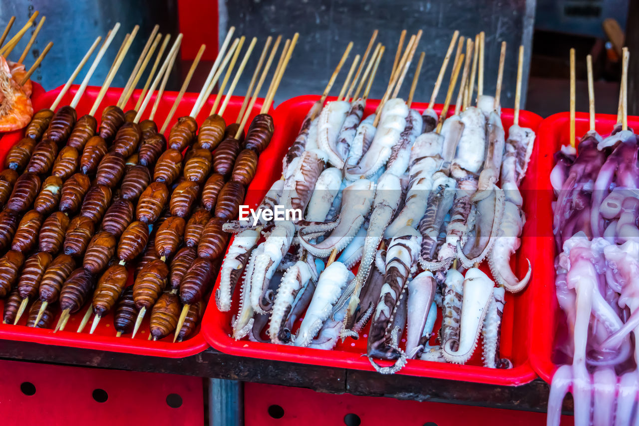 HIGH ANGLE VIEW OF FISH FOR SALE IN MARKET