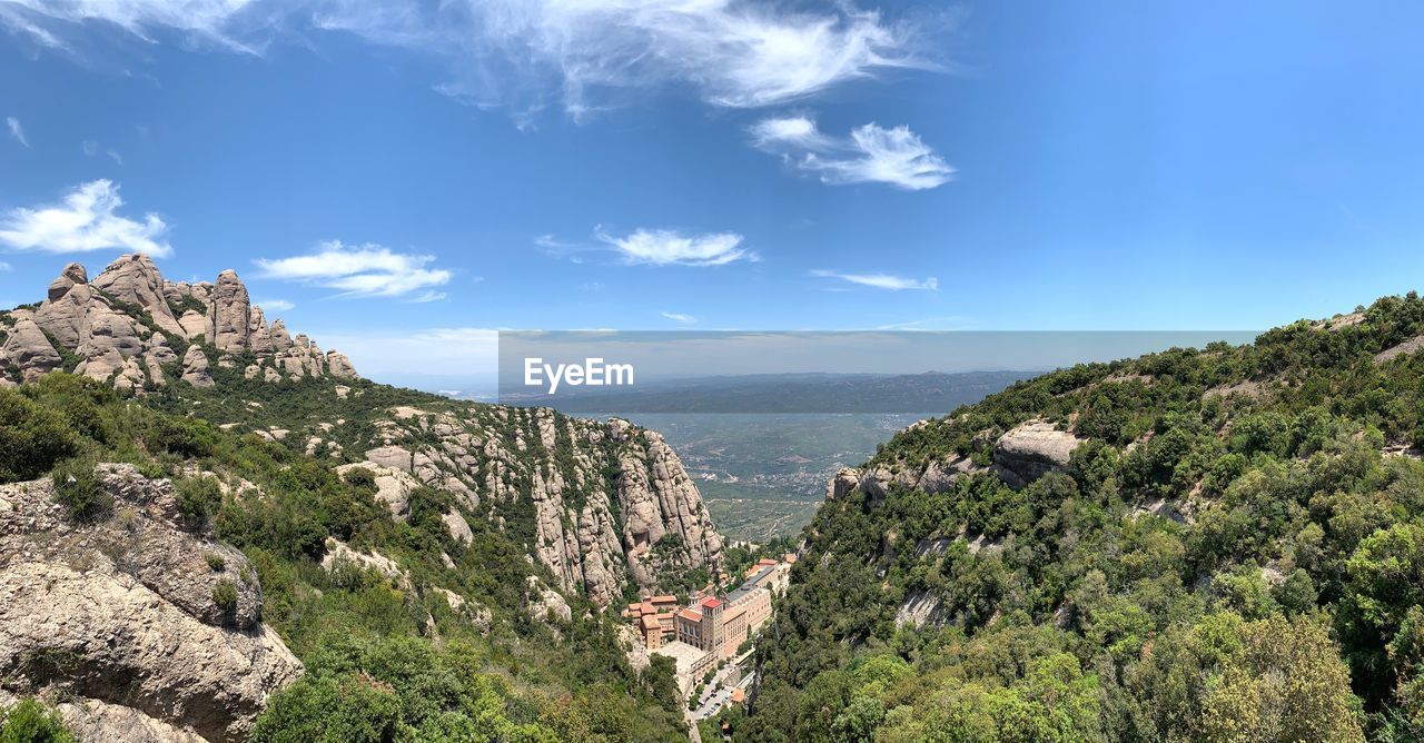 Sunny looking down at monserrat monastry from the top of the funicular 