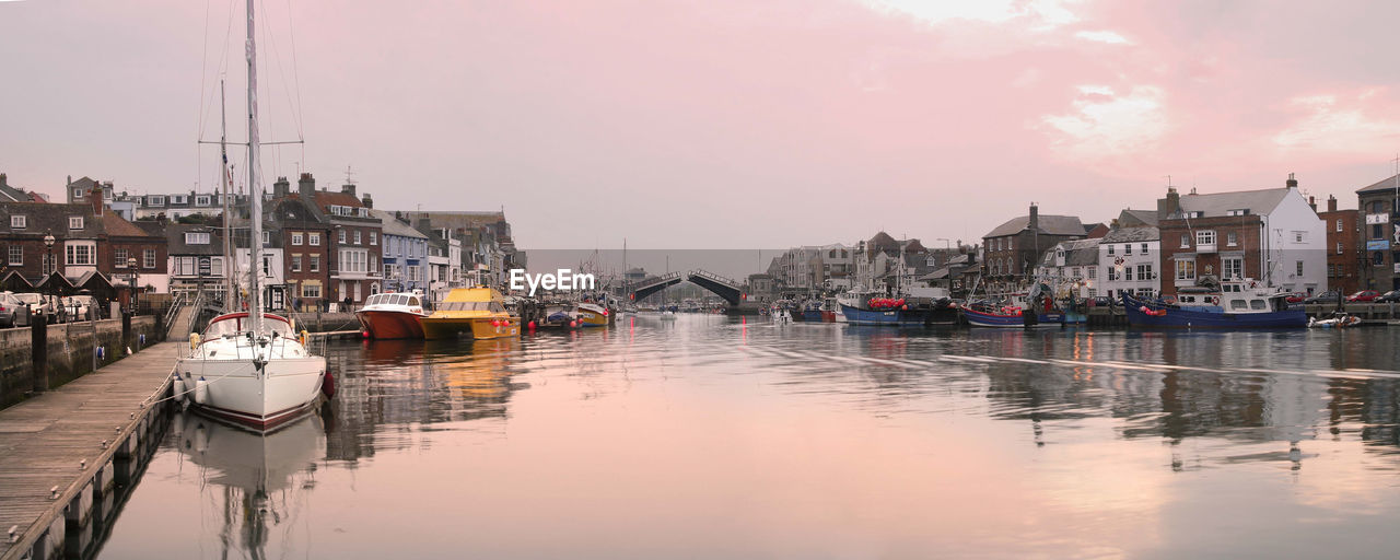 Boats moored in sea