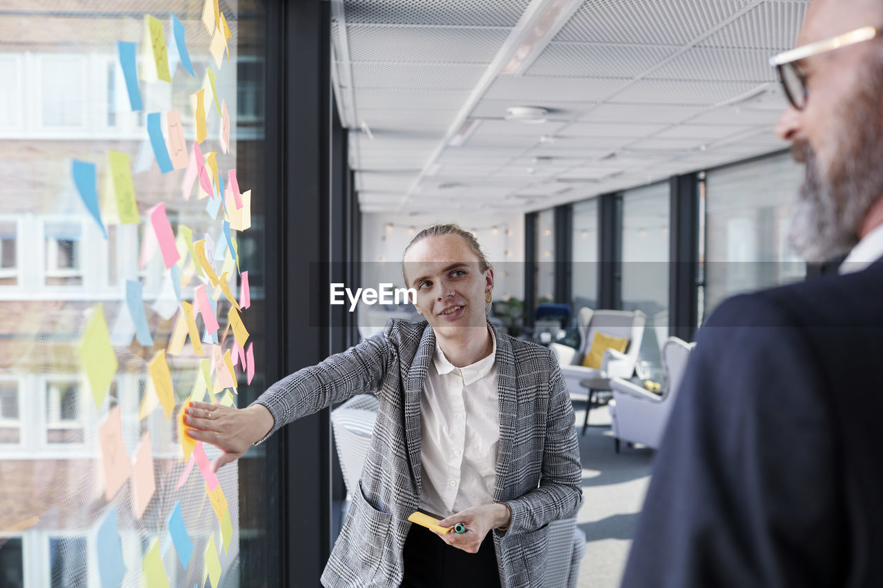 Coworkers having meeting in office