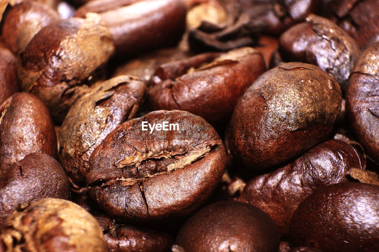 full frame shot of roasted coffee beans on table