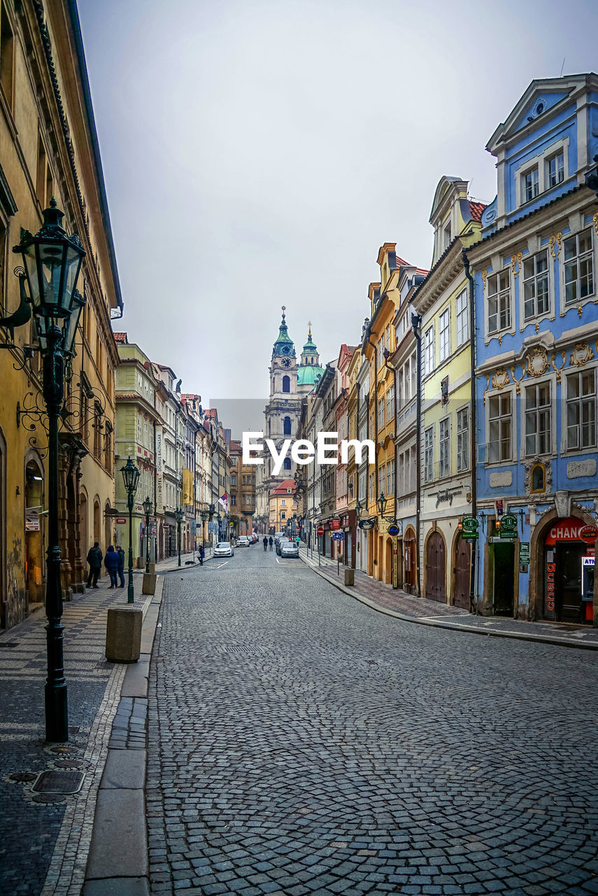 STREET AMIDST BUILDINGS IN TOWN