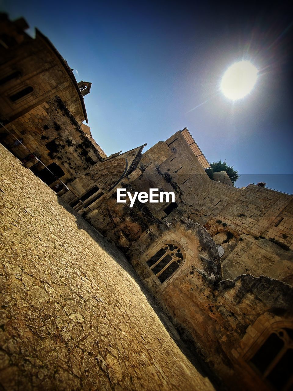 architecture, sky, history, night, the past, light, built structure, darkness, nature, building exterior, rock, low angle view, no people, temple, travel destinations, ancient, moon, building, old ruin, outdoors, reflection, travel, wall, fort, old, clear sky, ancient history, stone material