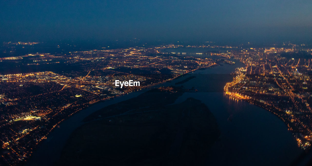 High angle view of illuminated city at night