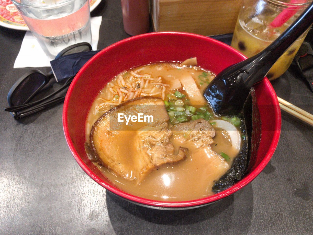 High angle view of tonkatsu with spoon served in bowl on table