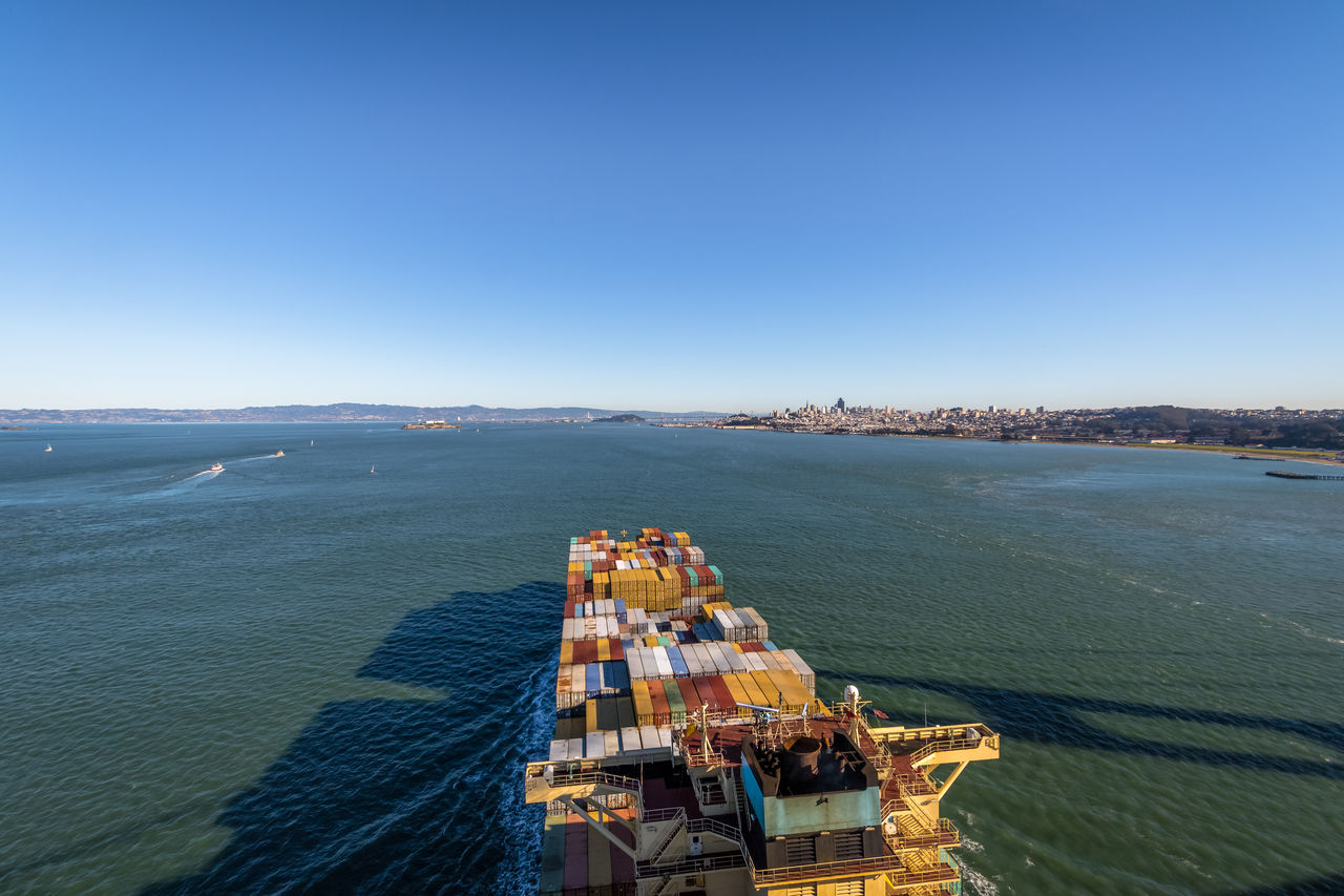 high angle view of sea against clear blue sky