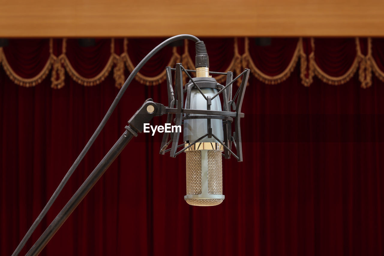 Microphone on stand in auditorium