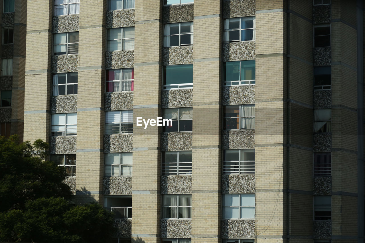 FULL FRAME SHOT OF BUILDING WITH APARTMENT BUILDINGS