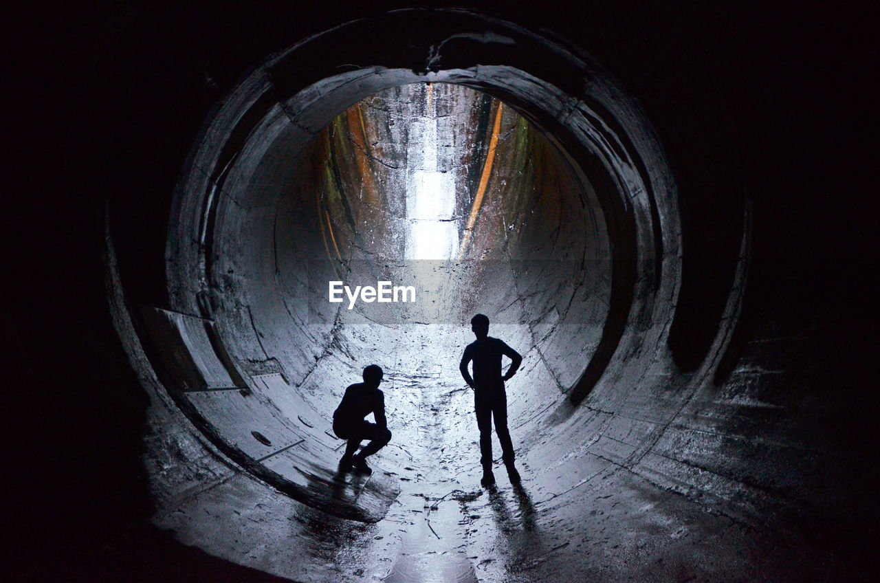 Two men in tunnel