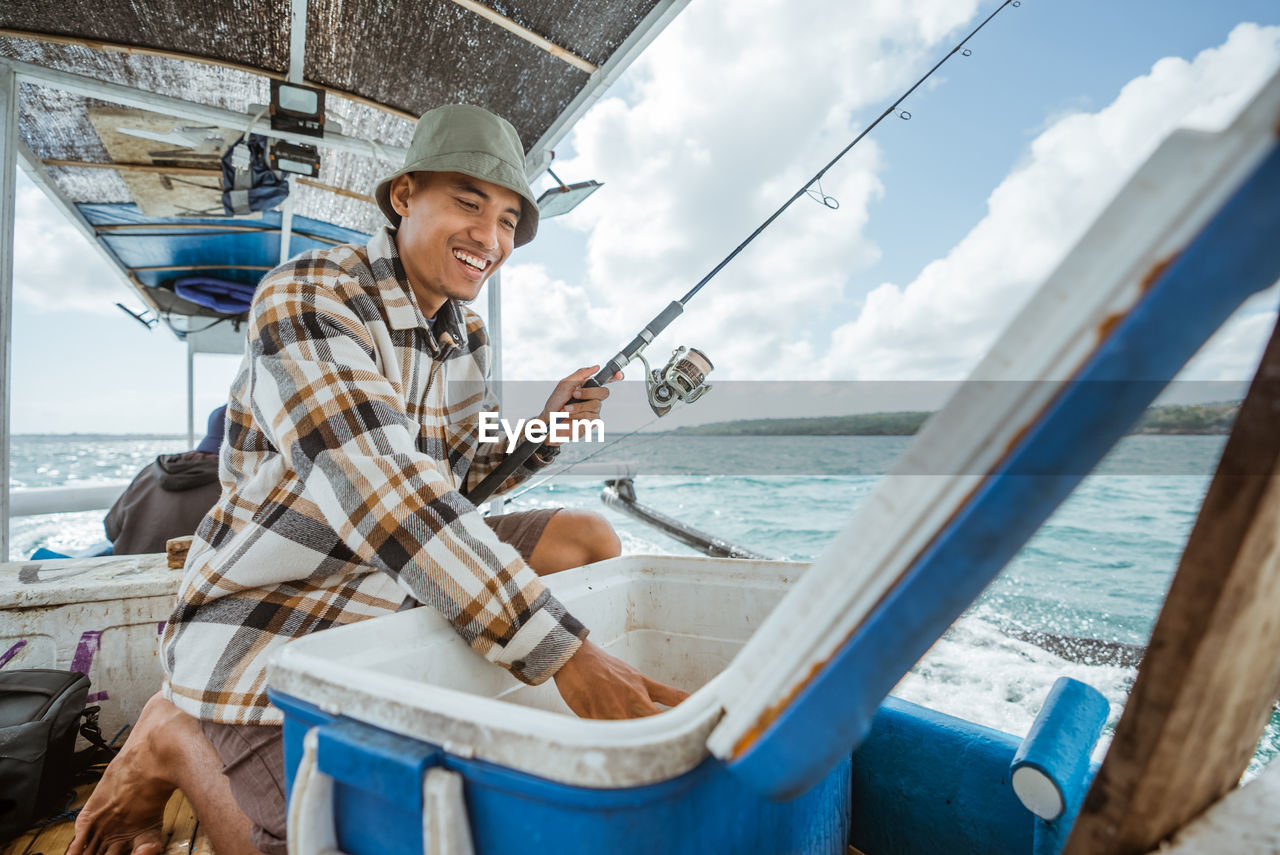 portrait of young woman in boat