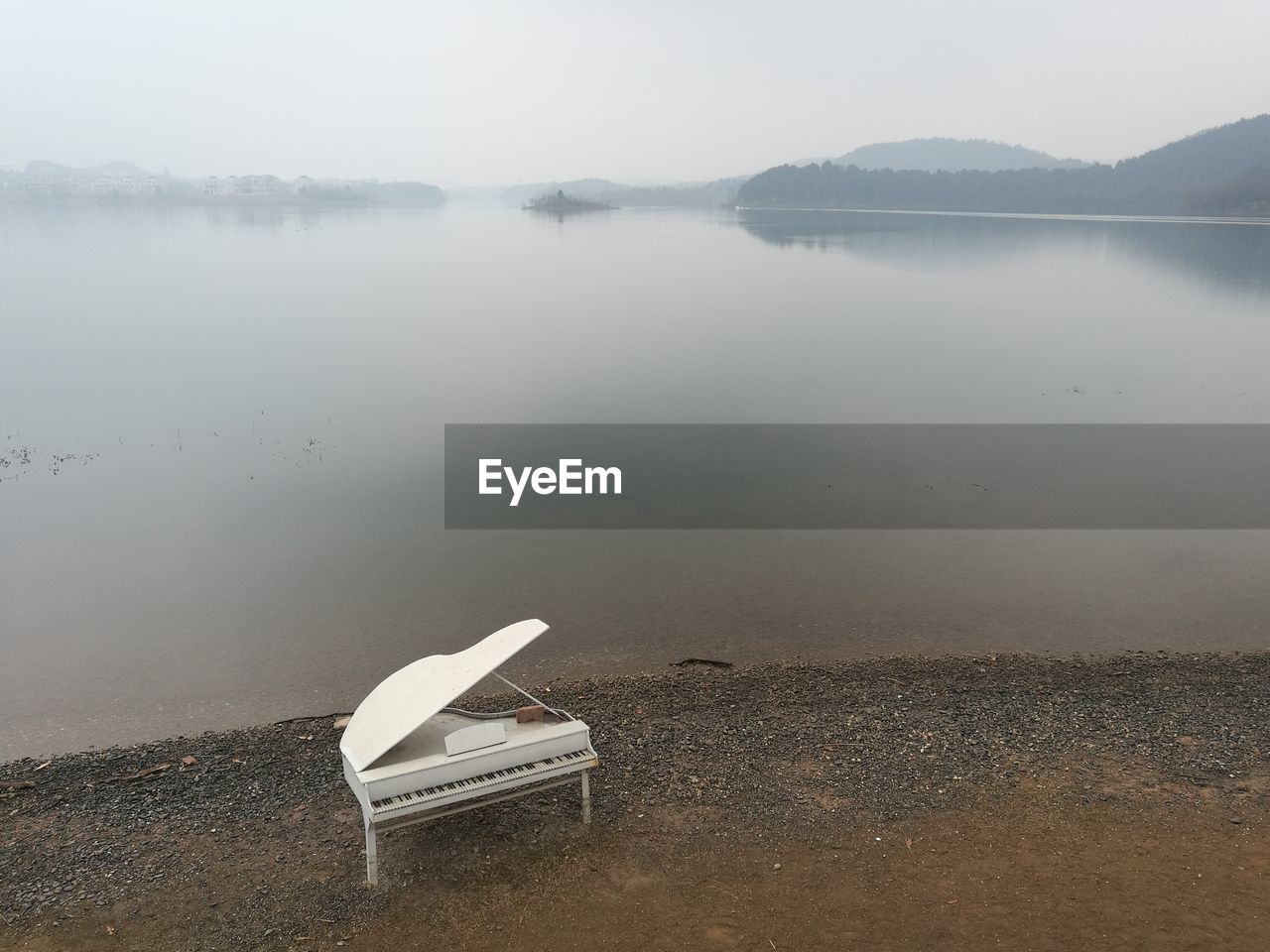 SCENIC VIEW OF LAKE ON FOGGY DAY