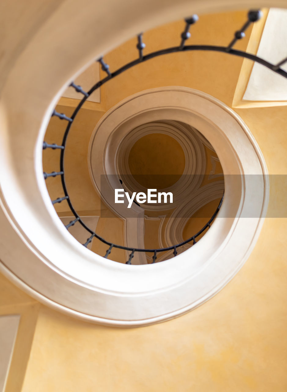 DIRECTLY BELOW OF SPIRAL STAIRCASE