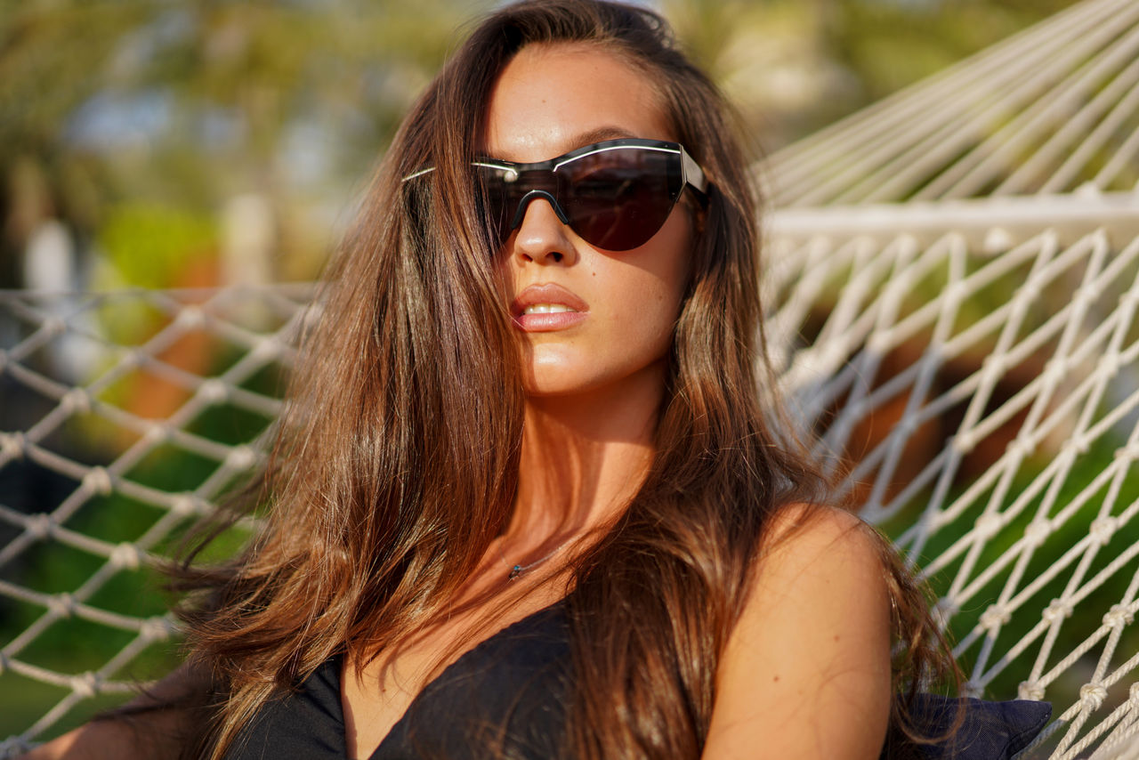 Woman relaxing in the hammock