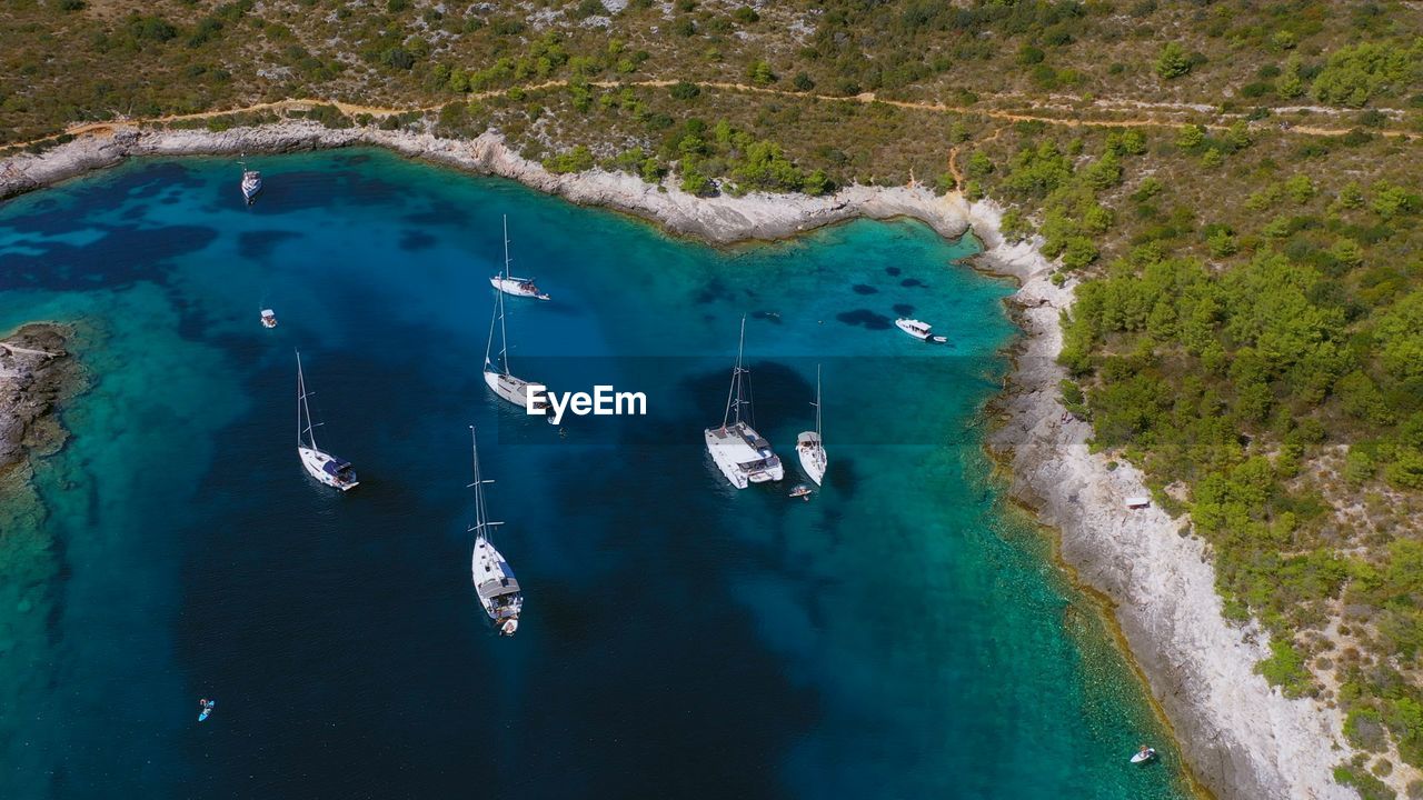 High angle view of sailing boats in bay. vacations, travel and active lifestyle concept