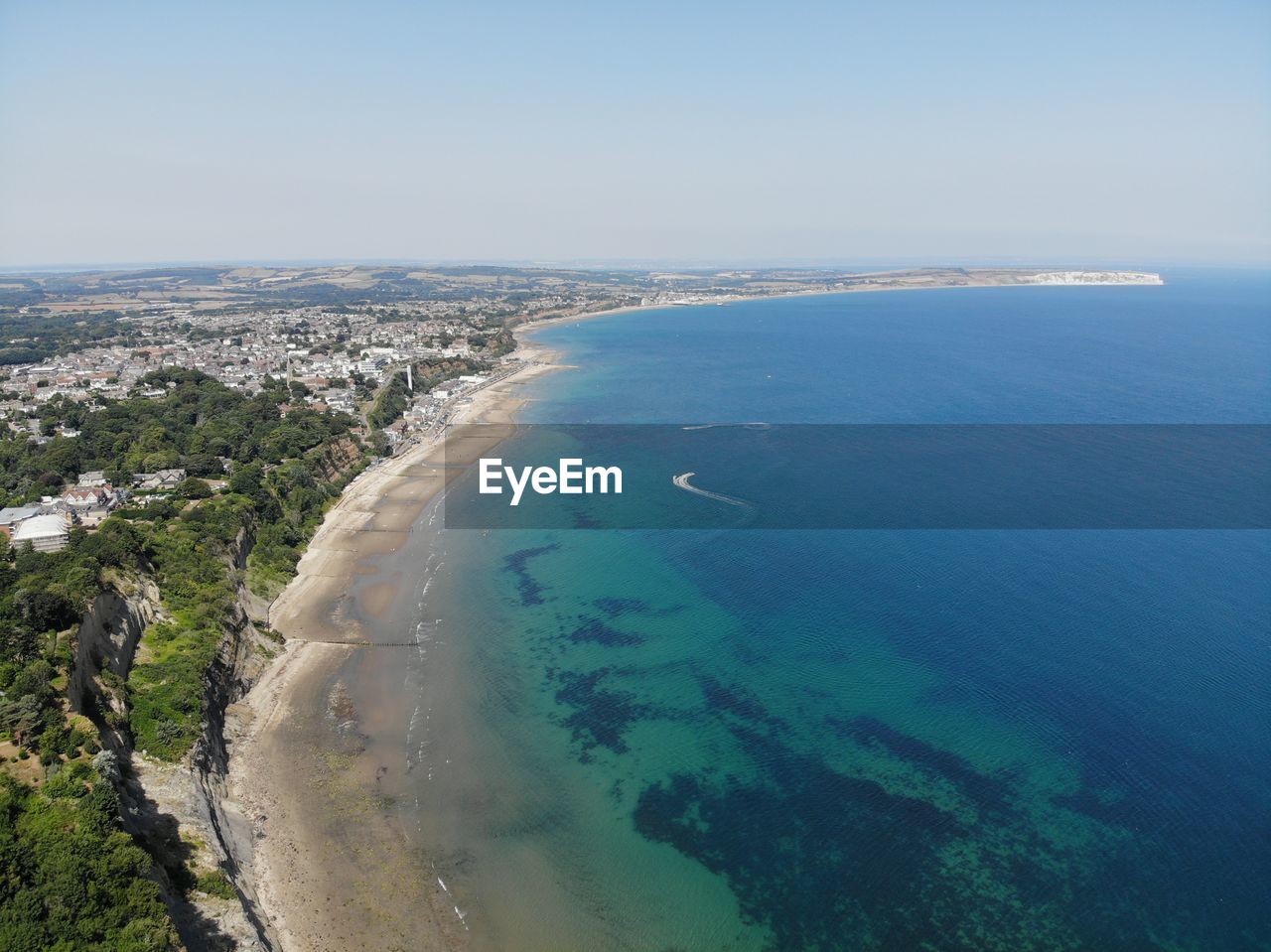 HIGH ANGLE VIEW OF BEACH AGAINST SKY