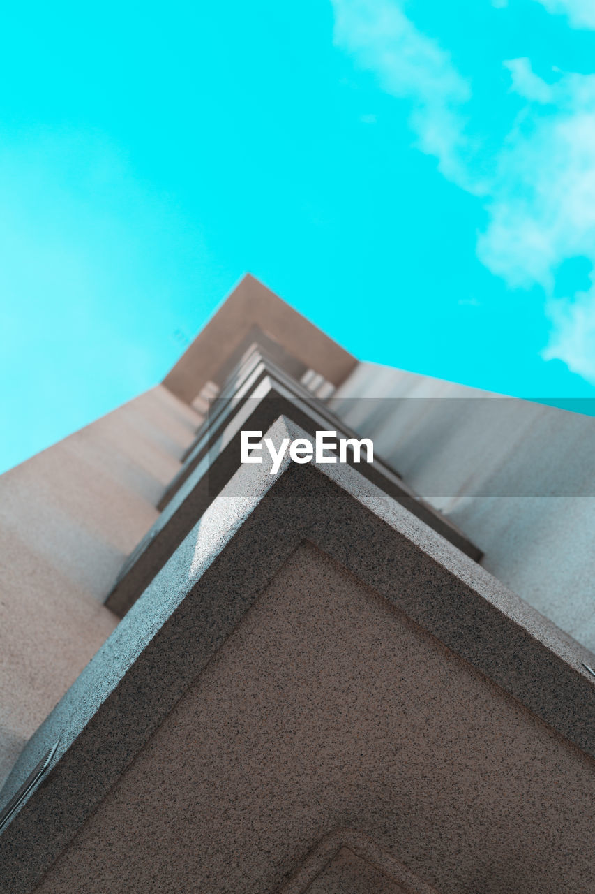 CLOSE-UP OF SWIMMING POOL AGAINST SKY