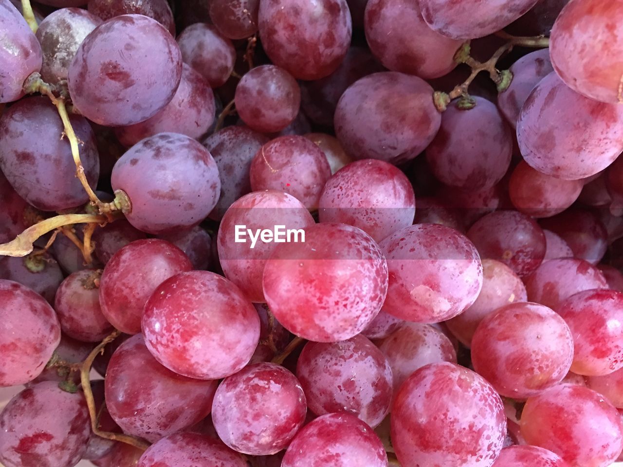 Full frame shot of red grapes at market