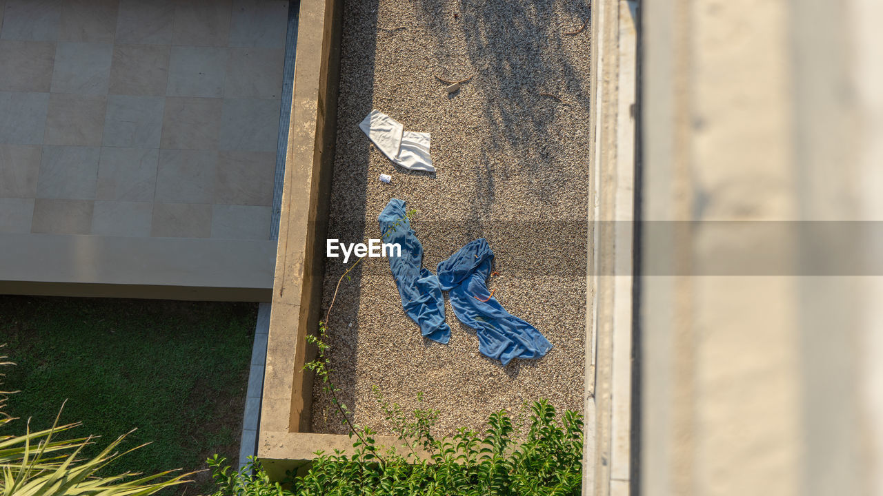 CLOTHES DRYING ON WALL