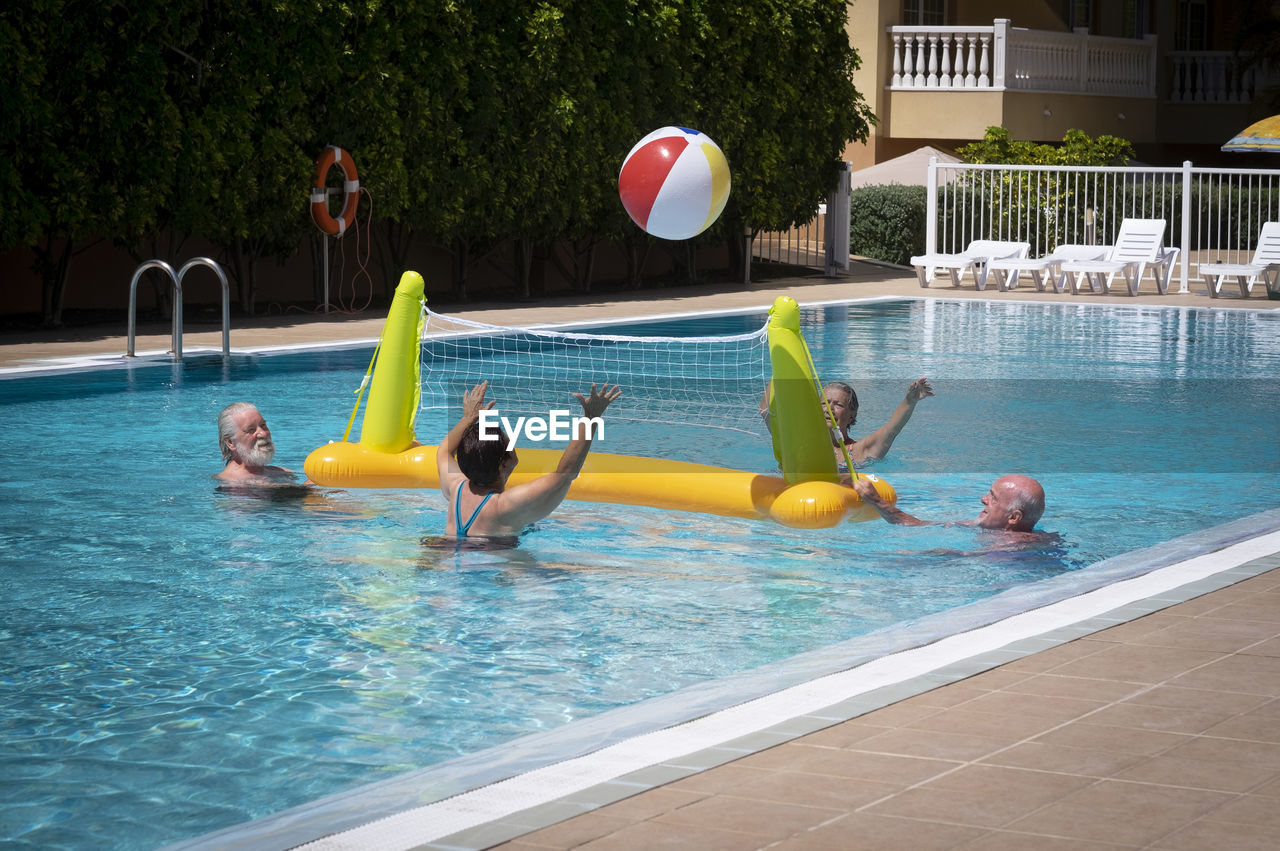 People swimming in pool