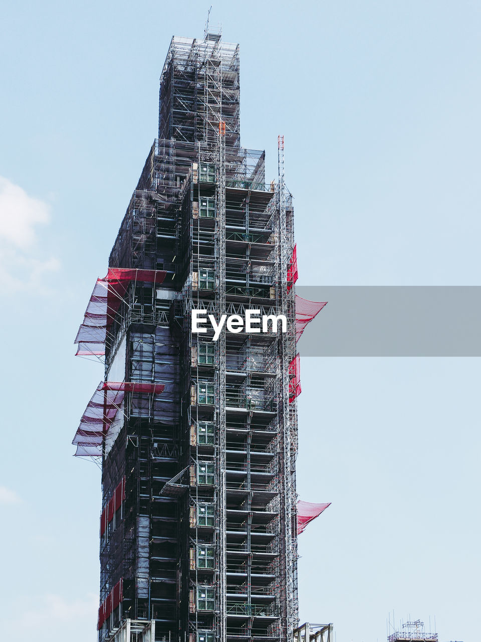 LOW ANGLE VIEW OF CONSTRUCTION SITE AGAINST SKY